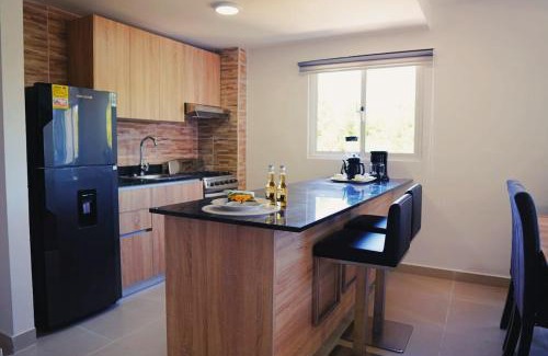 Yamasa Apartment | Caribbean Escape con balcón privado en Punta Cana