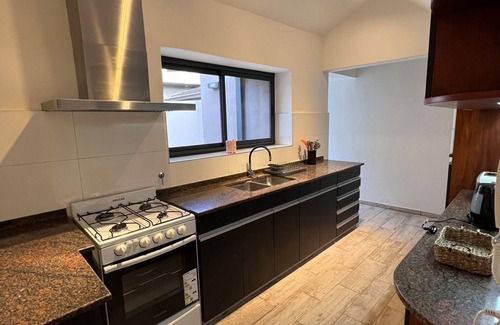 Cordoba House | Casa Calida Moderna y de Categoría