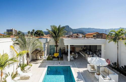 Indaia House | Casa com área gourmet e piscina na praia do Indaiá