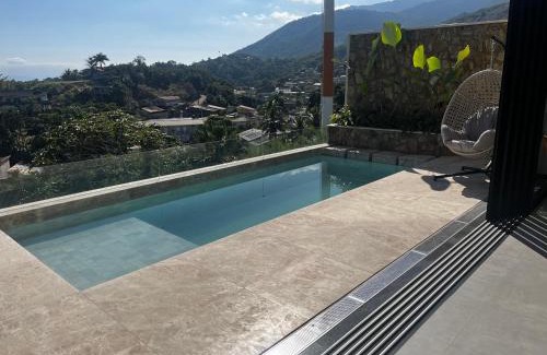 Itaguassu House | Casa com piscina aquecida, jacuzzi e 60 m da praia