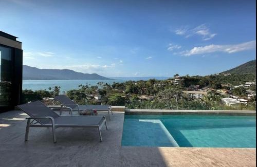 Itaguassu House | Casa com piscina aquecida, jacuzzi e 60 m da praia