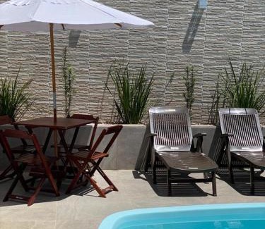 Prado House | Casa com piscina e um quarto com ar split pé na areia a 50 metros da praia