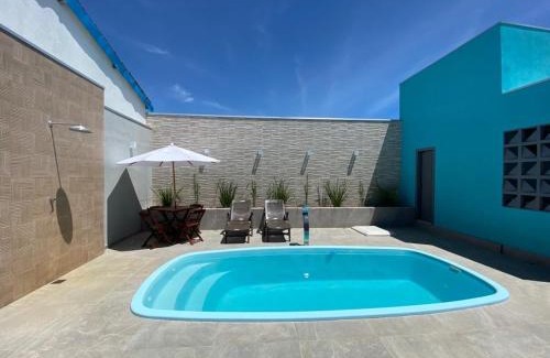 Prado House | Casa com piscina e um quarto com ar split pé na areia a 50 metros da praia