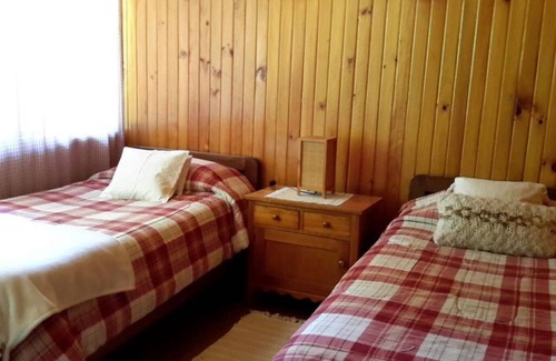 Villarrica House | Casa con vista al lago y playa privada