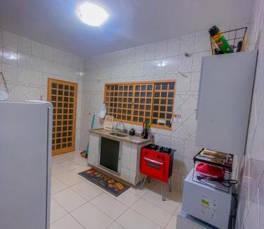 Aparecida House | Casa de Frente com Maria