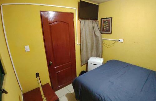 San Salvador House | Casa de huéspedes libertad