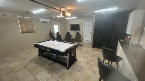 Cocoa Isles Villa | Casa De Olas - Waterfront Luxe Home - Heated Pool - Boat Lift - Minutes to Beach