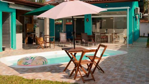 Balneario Mogiano House | Casa de Praia em Bertioga, São Paulocom Piscina Ar Condicionado Wifi a 500m do Mar
