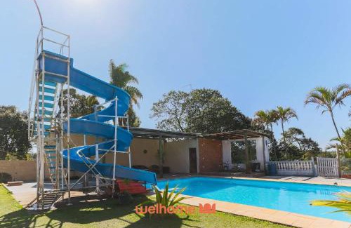 Cotia House | Casa em Cotia com piscina e área de lazer infantil