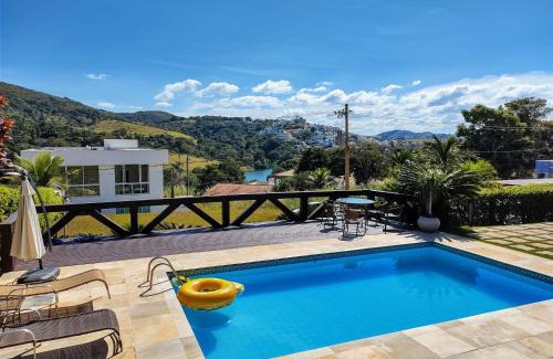 Capitolio House | Casa em Escarpas do Lago Ótimo Preço, Aconchegante, Área bem Ampla e Excelente Localização