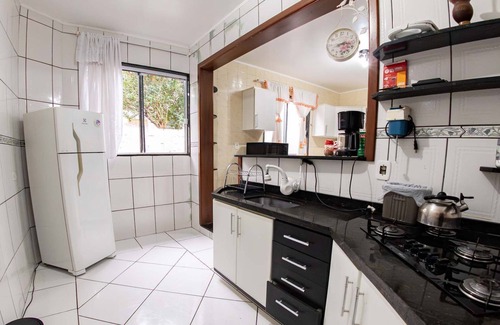 Petropolis House | Casa em Passo Fundo com Churrasqueira