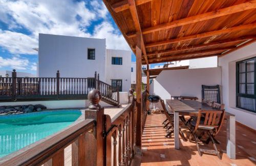Punta Mujeres House | Casa Hibiscus - Shared Pool and BBQ - Close to Seafront Promenade By Lanzarote Vacation Homes