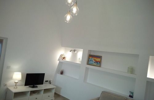 Oia House | casa sigala arch