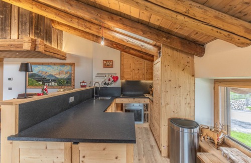 Cortina d'Ampezzo Apartment | Casa Verocip, a panoramic attic with a view of the Dolomites