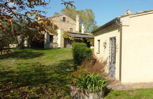 Santa Vittoria in Matenano Villa | Casale Oliva in a landscape of oaks, olive e cherry trees