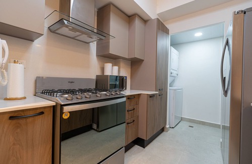 Ciudad Universitaria Apartment | Central and luxurious APT in Santo Domingo with services, pool, Wi-Fi and GYM