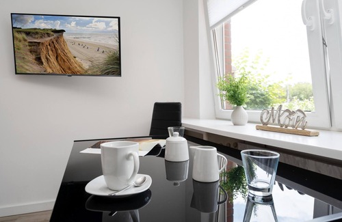 Westerland Apartment | Central app. for 2 persons, WLAN and TV, separate kitchen.