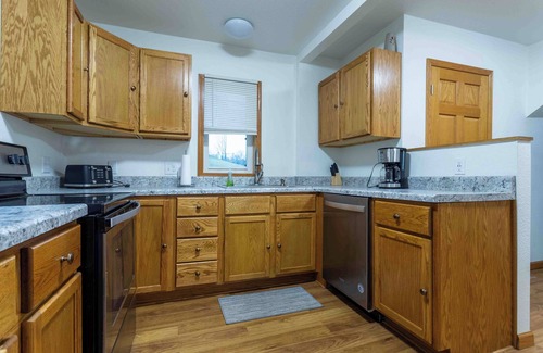 Dubuque House | Centrally located in family friendly neighborhood with off street parking.