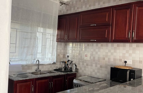 Kampala Apartment | Centrally located with easy access to the city and amenities.