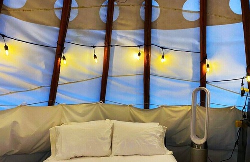 Cave Junction Apartment | Ceremonial Tipi - 20' - Sleeps up to 6 provided padded cots - bring your own sleeping bags
