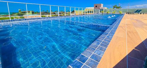 Porto de Galinhas Apartment | CG101- Flat Rooftop com piscina infinita e garagem- By Oasis Ferias