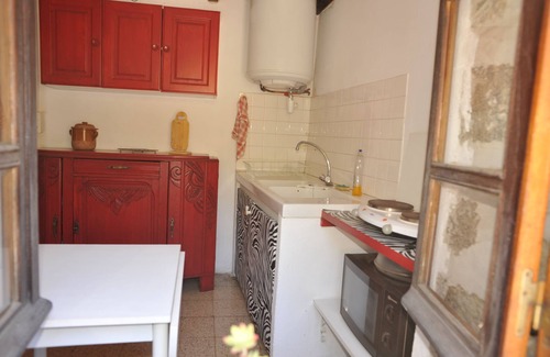 Guitera-les-Baines Cottage | Ch 4 street side in old stone cottage.