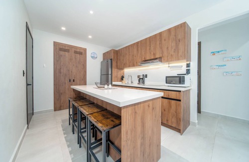 Santa Maria Huatulco Condo | Charming 2-bedroom condo minutes to the beach with 4 rooftop pools and BBQs
