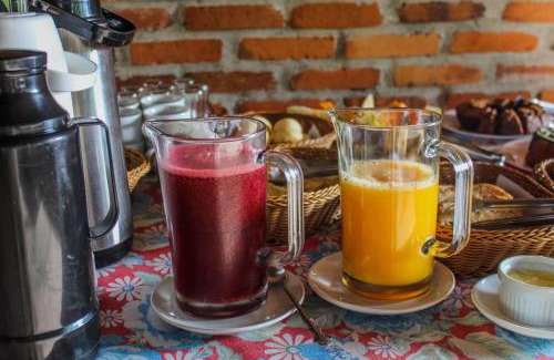 Praia Grande House | Chalé Suiço com Hidromassagem e café da Manhã