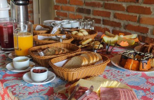 Praia Grande House | Chalé Suiço com Hidromassagem e café da Manhã