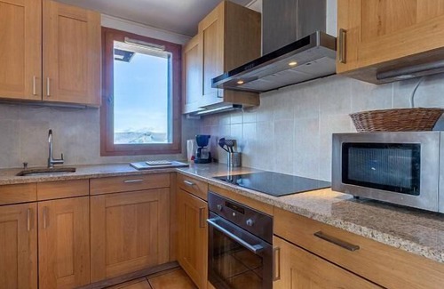 Plagne Soleil Ski Chalet | Chalet, 60m from shops, 3rd floor, view building, balcony, fireplace or stove, tv, ski locker, 85m²