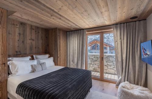 Saint-Marcel Ski Chalet | Chalet neuf avec piscine chauffée, espace détente, sauna, bain nordique et salle de cinéma - FR-1-570-57