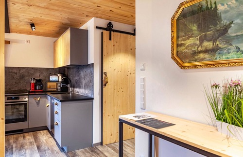 Farchant Ski Chalet | Chalet Rauschn with mountain view with whirlpool, shared sauna, terrace, balcony.