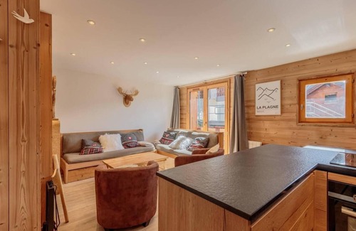 Plagne Soleil Ski Chalet | Chalet, ski-in/ski-out & foot of the slopes, 2nd floor, view resort, balcony, fireplace or stove, tv