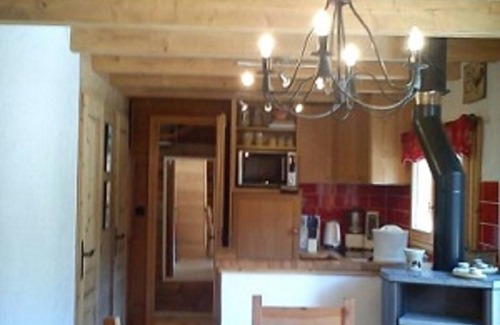 Les Tines Ski Chalet | chalet with garden and parking lot in front of Mont-Blanc