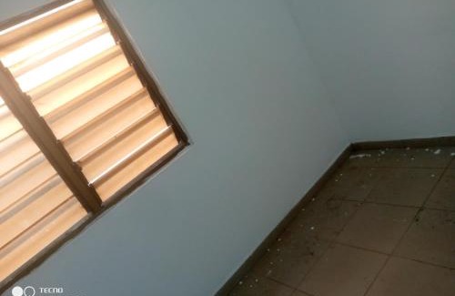Adetikope Bed & Breakfast | Chambre salon meublée