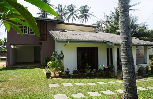 Ambalangoda House | Champtil Ambalangoda, Large house with garden next to the beach and sea.