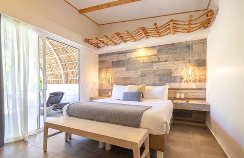 Tamarindo Hotel | Chanbre élégante avec douche tropicale