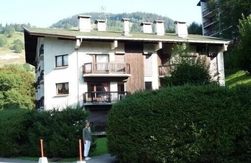 Megeve Apartment | Character apartment with fireplace in residence with summer swimming pool.