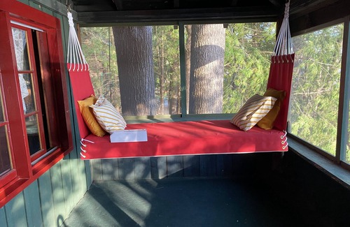 Lake George Cottage | Charming 1920's cottage on Lake George w/boat slip & sundeck.