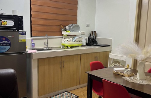 Cebu Condo | Charming 2-bedroom condo with fitness room and AC in delightful Cebu