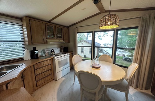 Meredith House | Charming 2-bedroom Ranch Style Waterfront Mobile with Boat dock in Meredith - AC