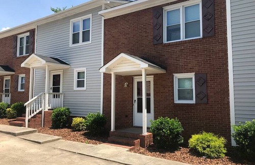 Greensboro House | Charming 2-bedroom townhome with WiFi, AC in Greensboro Big screen Smart TVs
