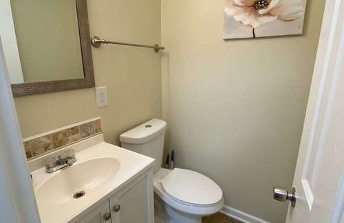 Greensboro House | Charming 2-bedroom townhome with WiFi, AC in Greensboro Big screen Smart TVs