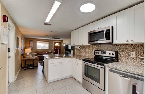 New Smyrna Beach House | Charming 2 BR Beachside Escape - Pet Friendly and just steps from the sand!