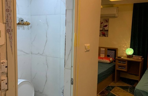 Sheikh Zayed City Apartment | Charming 2-bedroom studio in delightful 6th of October City with WiFi, AC