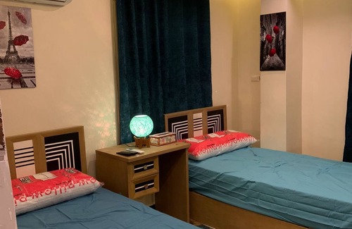 Sheikh Zayed City Apartment | Charming 2-bedroom studio in delightful 6th of October City with WiFi, AC