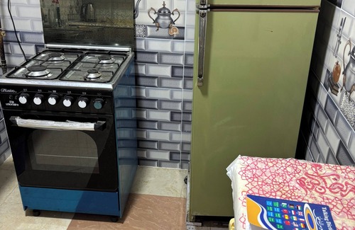 Sheikh Zayed City Apartment | Charming 2-bedroom apartment with fitness room and AC in El Sheikh Zayed City