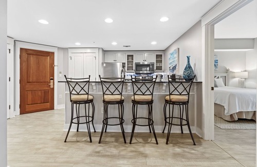 Baytowne Wharf Condo | Charming 2BR at Wharf! Beach, Tropical Pool + Hot Tub, Tram, Spacious Balcony