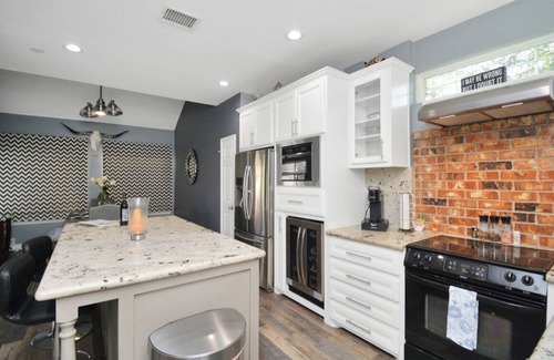 Barker House | Charming 3-bedroom patio house in peaceful Champions near Golf Course.