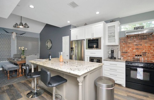 Barker House | Charming 3-bedroom patio house in peaceful Champions near Golf Course.